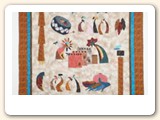 I purchased this quilt kit “A Maizing Southwest” by Arlene Walsh while visiting Santa Fe.  It is all appliquéd and took about two months to finish.  I wasn't sure how I was going to hang it, so I went looking for quilt hangers online and found your site.  I thought "Wow, if this thing really works, what a fabulous way to display my work!"  It now hangs in my living room.  I ordered your hanger and it arrived 3 days later.  I couldn't believe how quickly it was shipped.  I hung my quilt the same day.  As you can see, it hangs perfectly straight and took less than 10 minutes for the entire process.  Thank you thank you - I'll be back for more.
- Deb G, Colorado