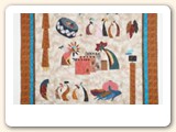 I purchased this quilt kit “A Maizing Southwest” by Arlene Walsh while visiting Santa Fe.  It is all appliquéd and took about two months to finish.  I wasn't sure how I was going to hang it, so I went looking for quilt hangers online and found your site.  I thought "Wow, if this thing really works, what a fabulous way to display my work!"  It now hangs in my living room.  I ordered your hanger and it arrived 3 days later.  I couldn't believe how quickly it was shipped.  I hung my quilt the same day.  As you can see, it hangs perfectly straight and took less than 10 minutes for the entire process.  Thank you thank you - I'll be back for more.
- Deb G, Colorado