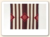 This is a quilt based on a "chief blanket" design; made by High Desert Concepts.
- Ellen